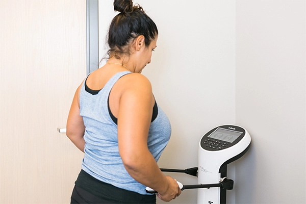 Weight Loss Middle GA Woman On Machine